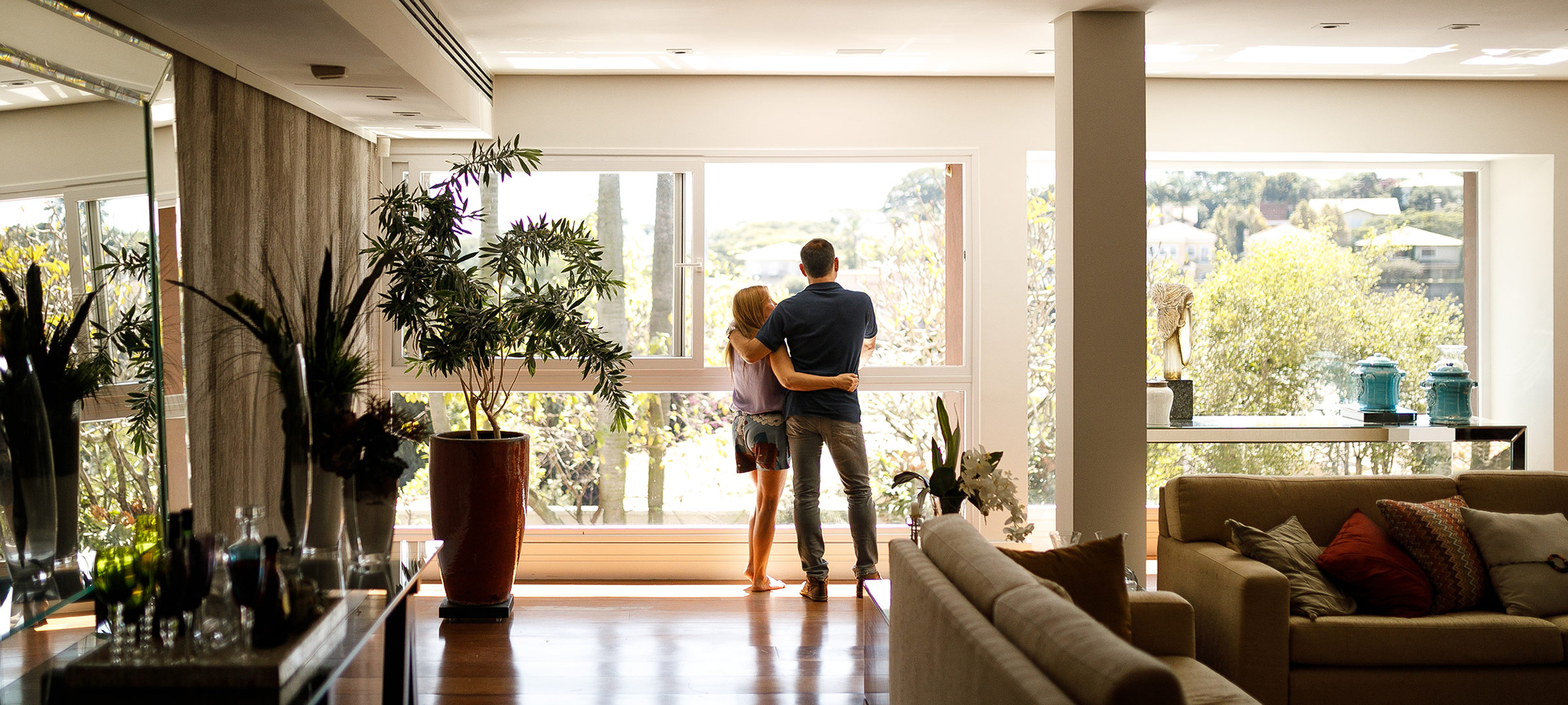 Couple looking out window.